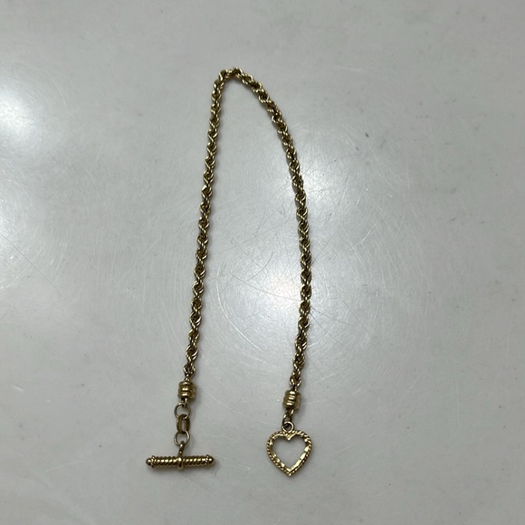 Beautiful 14 kt yellow gold rope bracelet heart toggle closure. Approx 2.46 g. - Picture 3 of 13